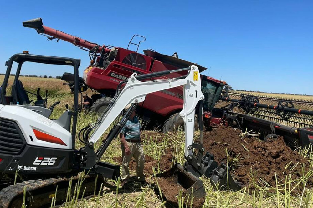 Bogged well and truly and ‘auger pointing to the sky’.