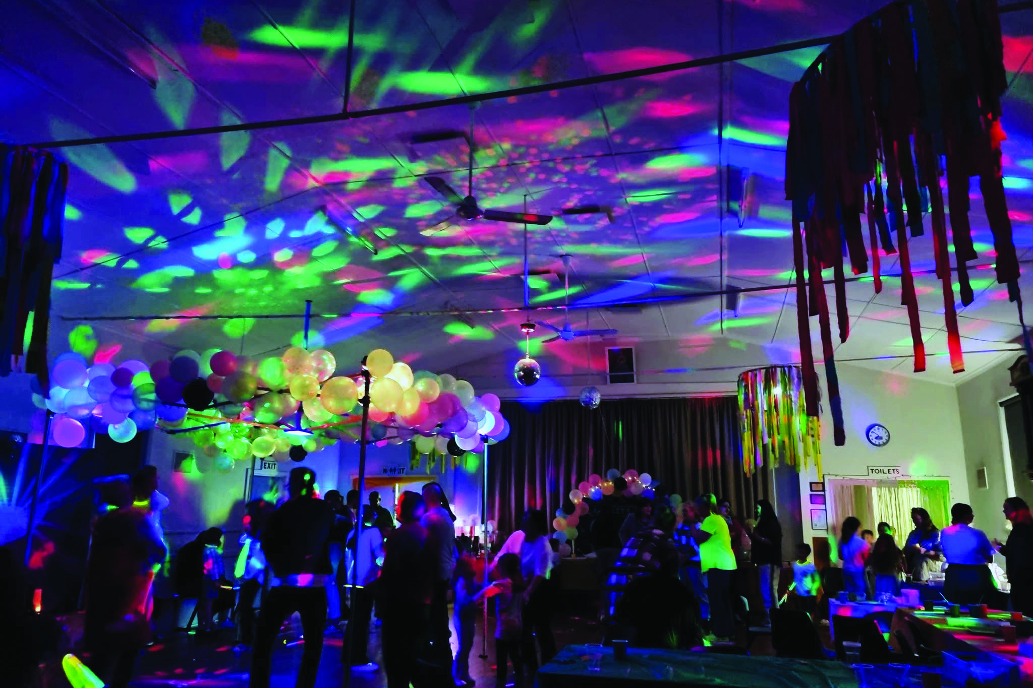 Dancing under the neon lights in Paradise - feature photo