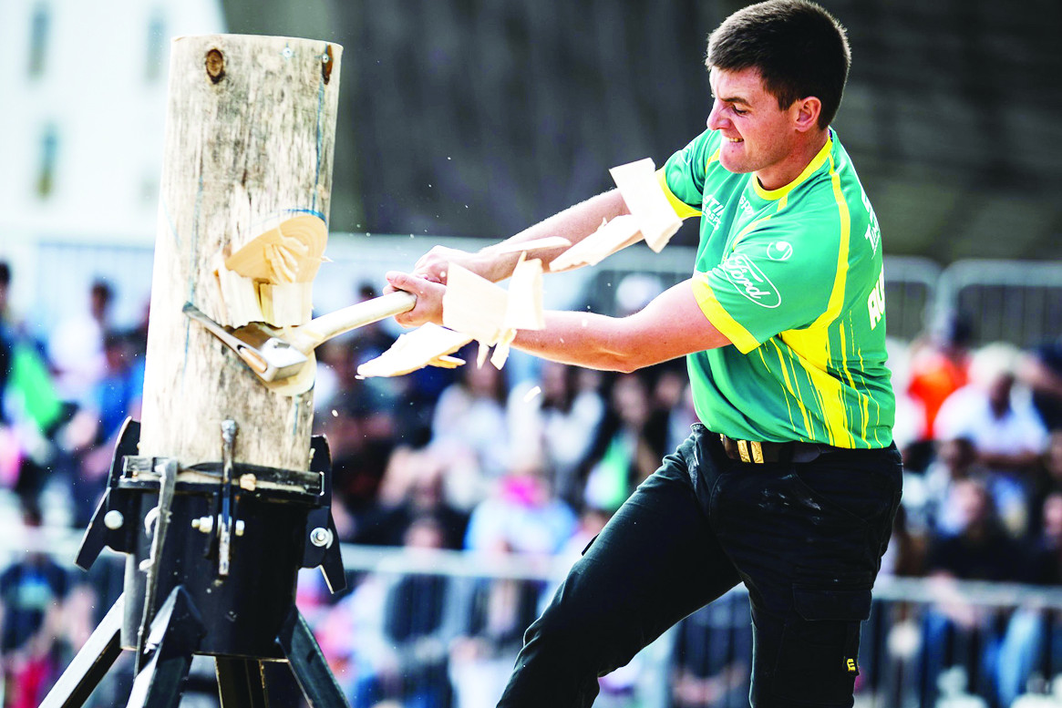 Matt Coffey performing in the Rookie World Championships of the Wood Chopping. - PHOTO: Supplied