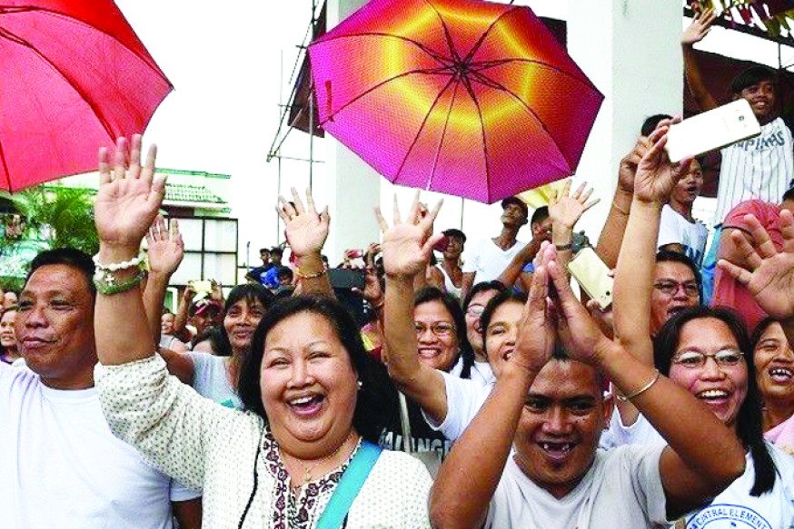 An outgoing and fun loving group of Filipinos (not from St. Arnaud) in full celebration.