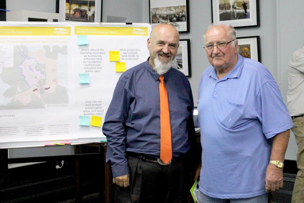 Cr Eddy Ostarcevic chats with Bernie Casey at the Structures Plan night.