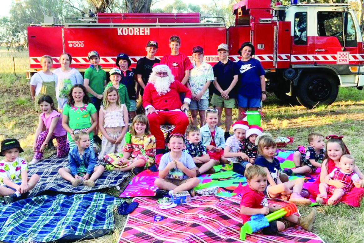 Santa with the younger members of the Kooreh community.