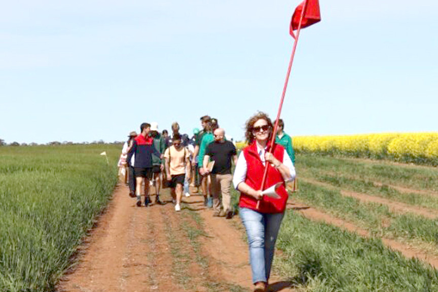 Angela Liston, BCG, leading a group of farmers and secondary students around the main site