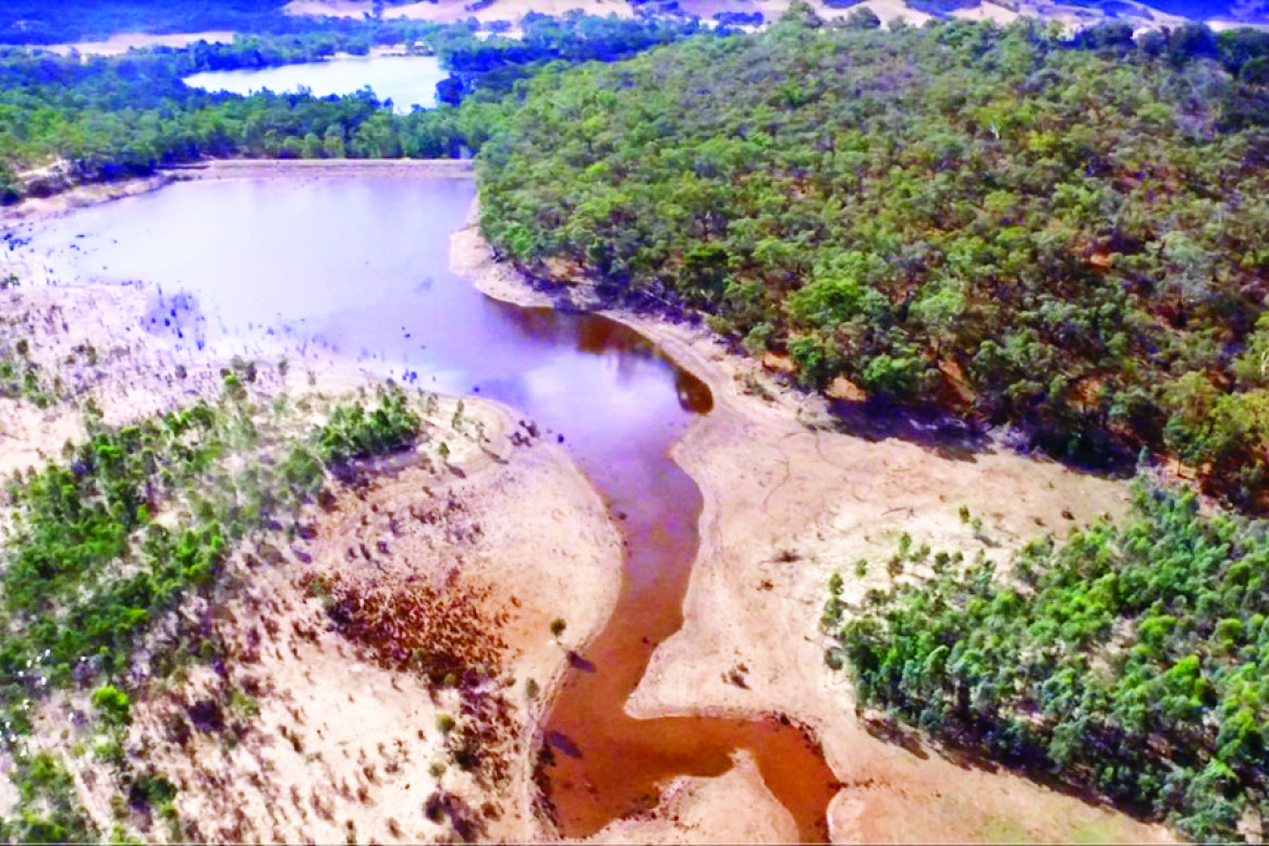 A drone aerial photo from 2023 illustrating the receding body of water due to Parks Victoria action to open the valve between the two reservoirs. PHOTO: Supplied