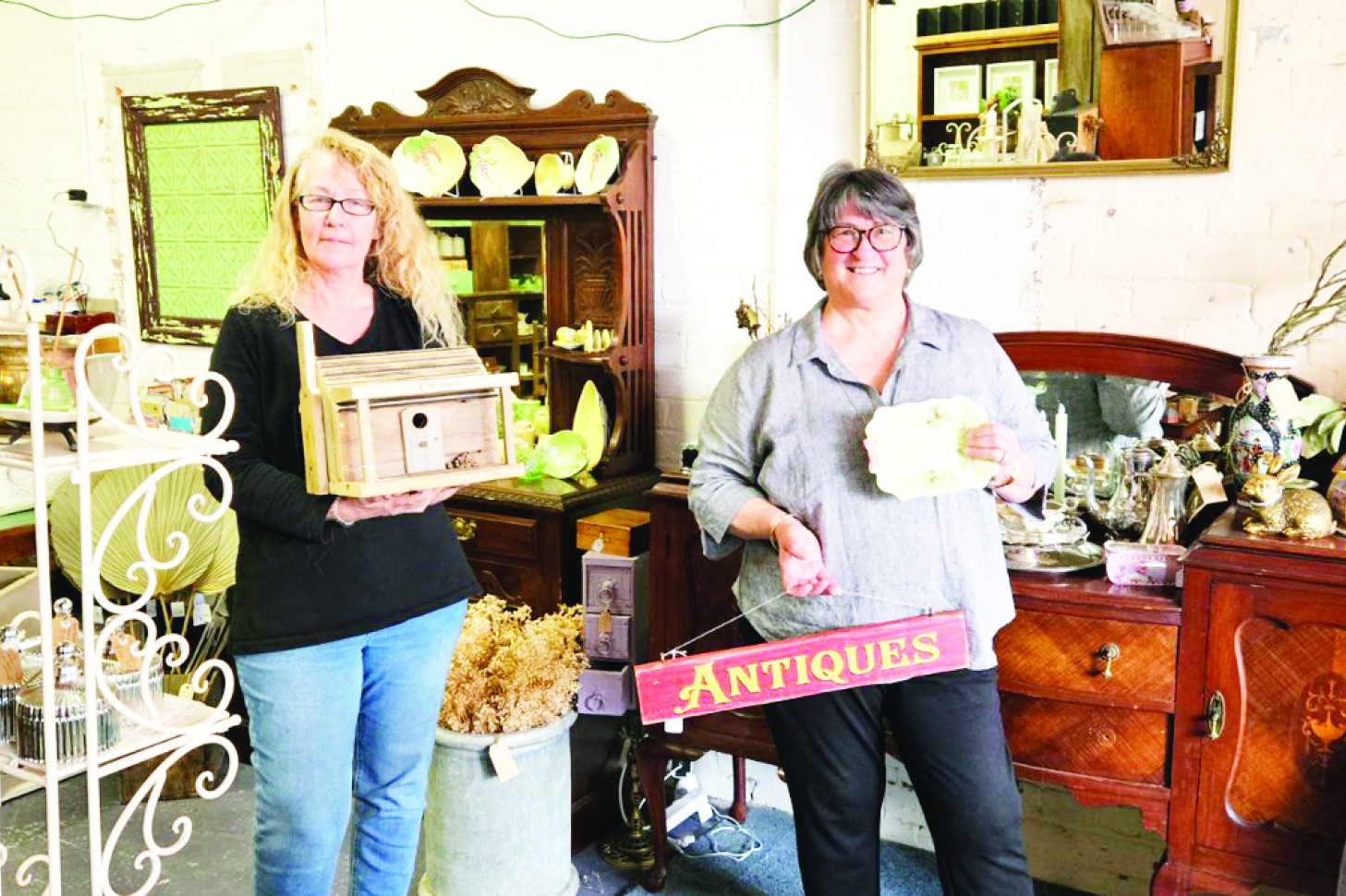 Above: Narelle Gust with Trish Petty (right) who will operate the Lilac Home and Garden shop next to the motel at 121 Napier Street.