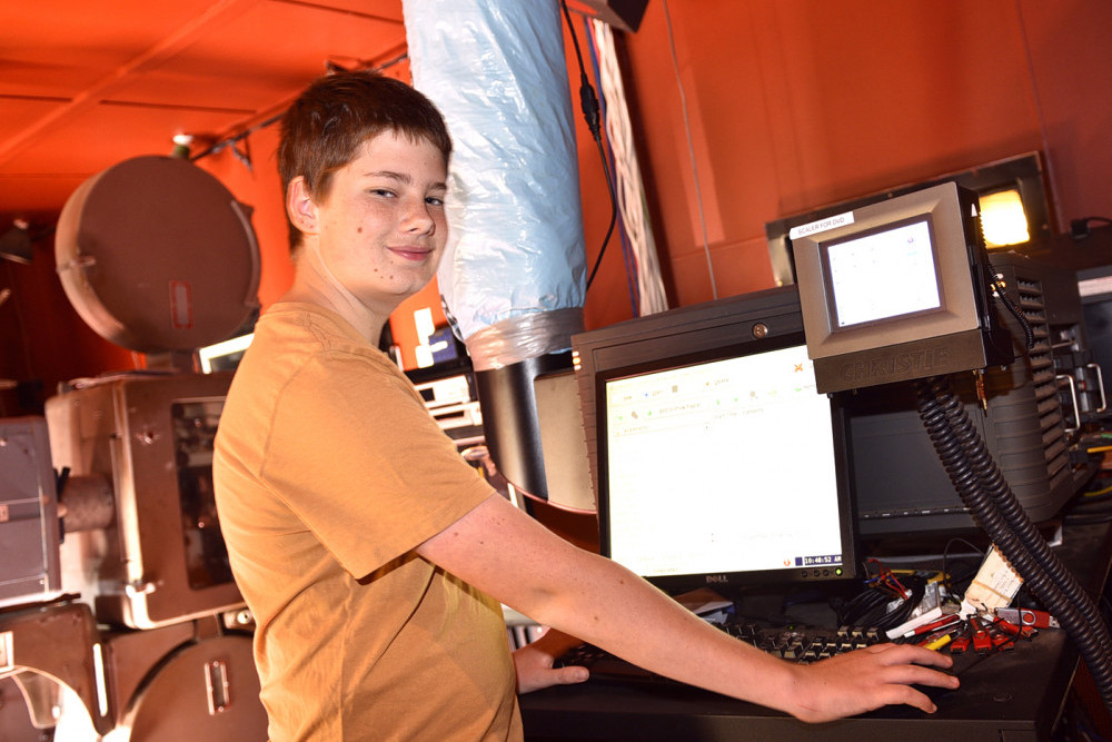 One of the valued volunteers at the Rex Theatre is young Charlton local, Lennon, who is learning the subtleties of running the Doremi digital projector and boosting the volunteer base for the community operated venue.