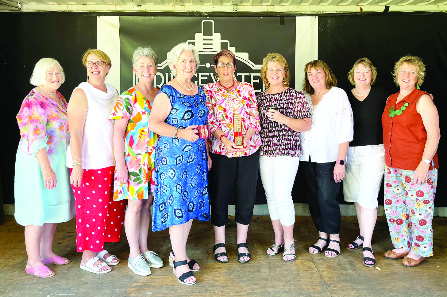 Above (eft to right): Jan Rinaldi, Jane Sutherland, Tricia Hines, Robyn Vanrenen, Di Martin, Di Horsfall, Wendy Shaw, Sue Sutton and Helen Rigby. Absent: Christine Cameron and Leanne Burke.