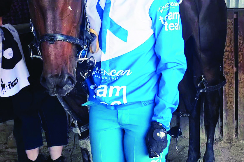 Stawell winner Chogi with Ellen Tormey wearing the Team Teal colours as part of HRV’s fundraising campaign supporting women with gynaecological cancer