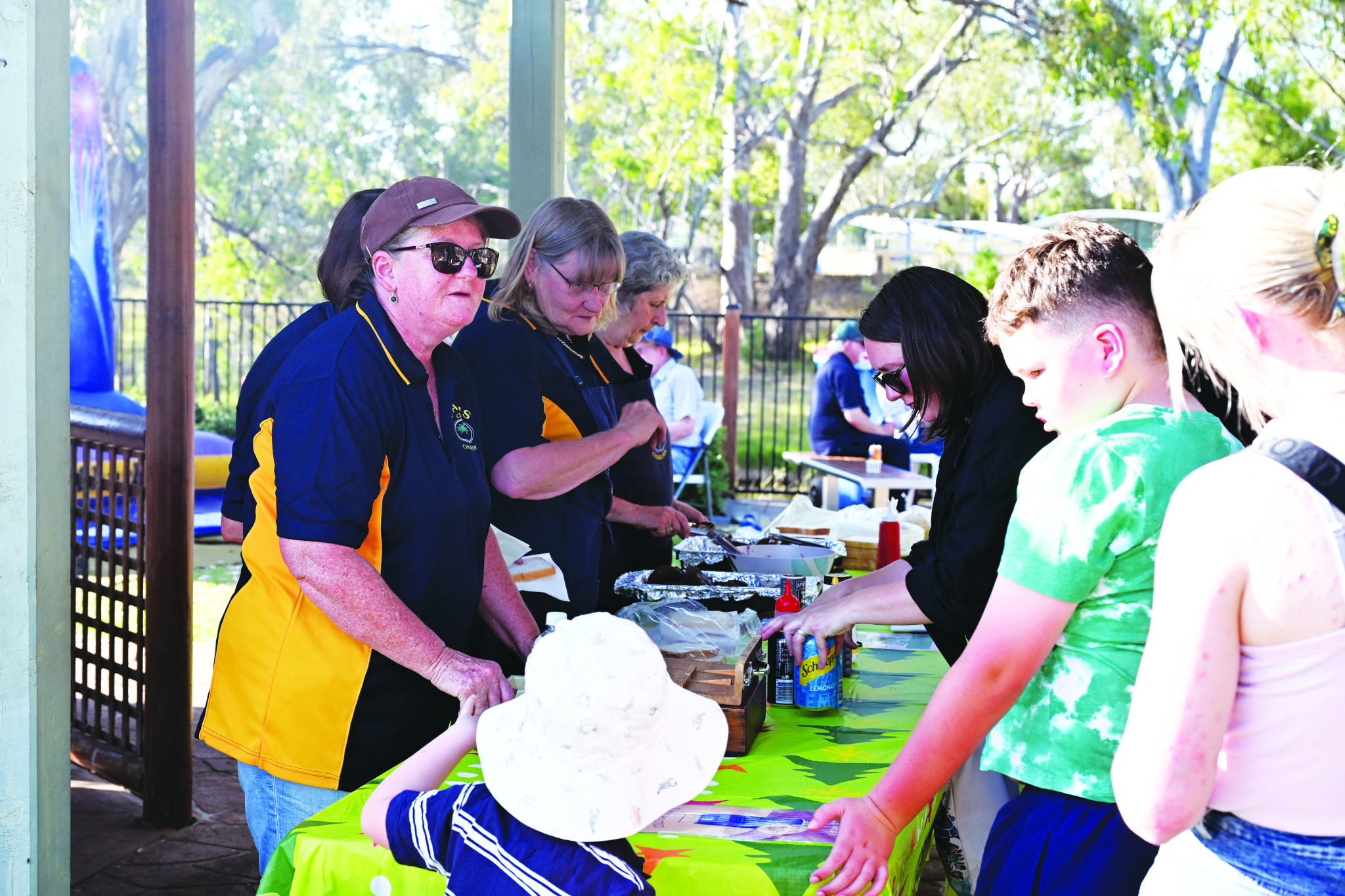 Oasis Charlton members on BBQ duty. NCN PHOTOS